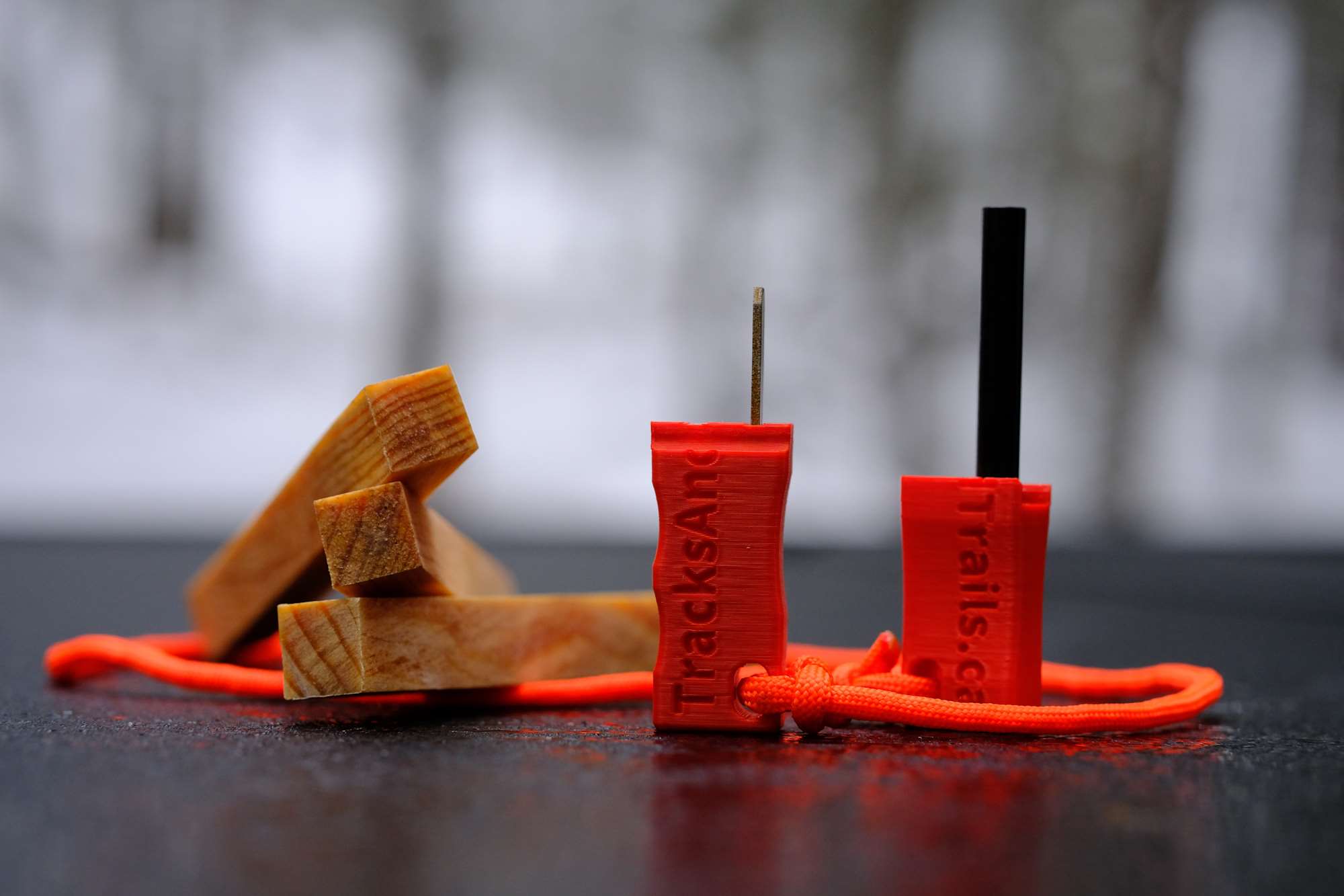 three-fatwood-sticks-red-case-Compact-Reliable-QUICK-FIRE-Striker-with-orange-paracord2